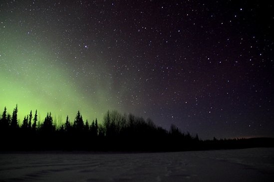 Une petite Aurore Boréale près d lac Kalix en Laponie