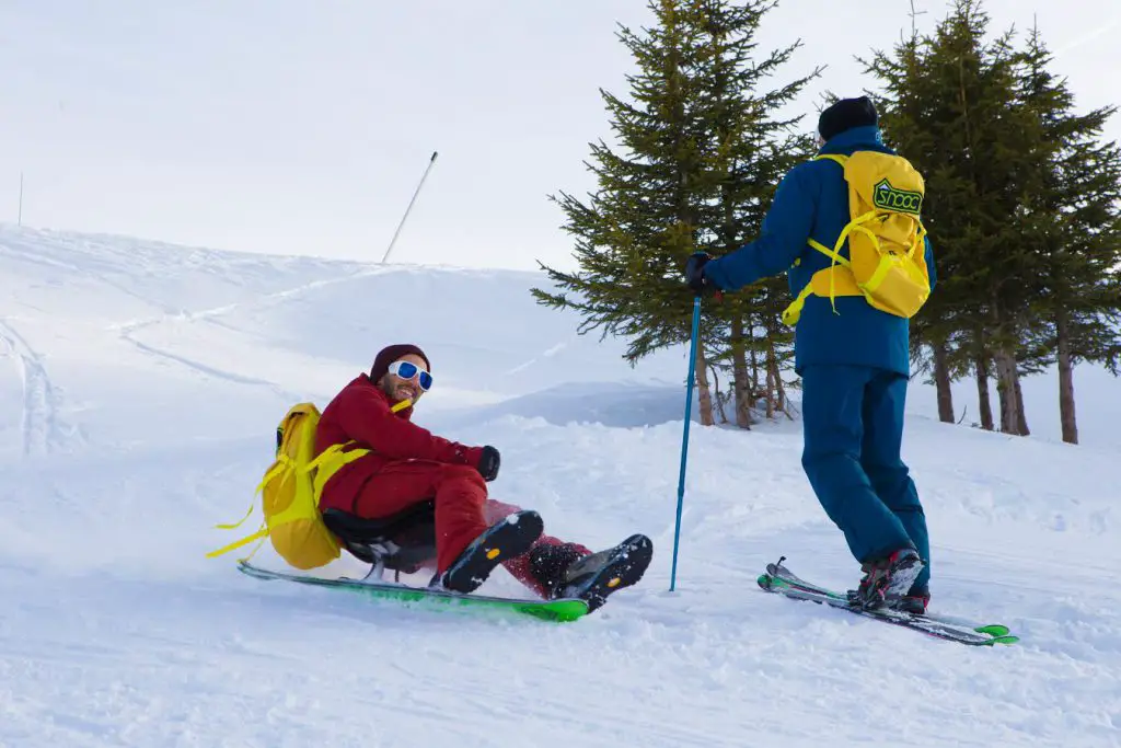 Montée et descente en SNOOC sur la neige