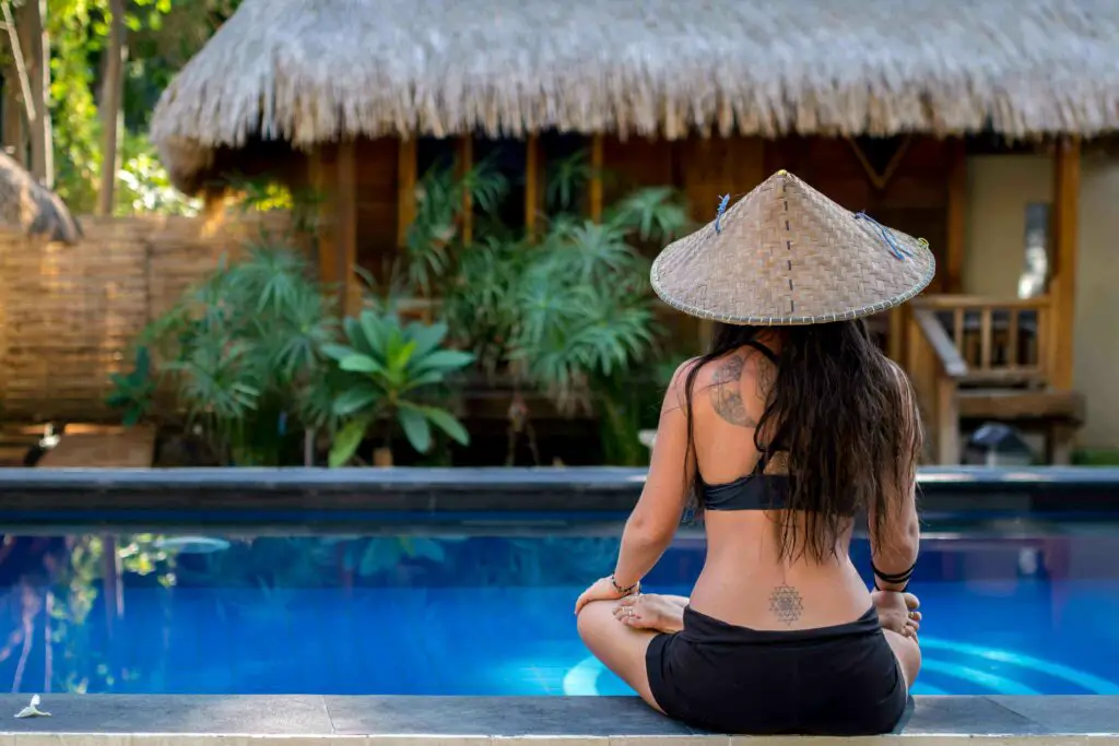 meditation by the pool of H2O Yoga Studio in Gili Air