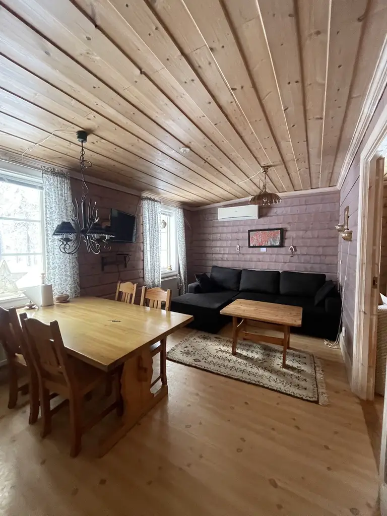 salon dans chalet du camp en laponie à Mellanström